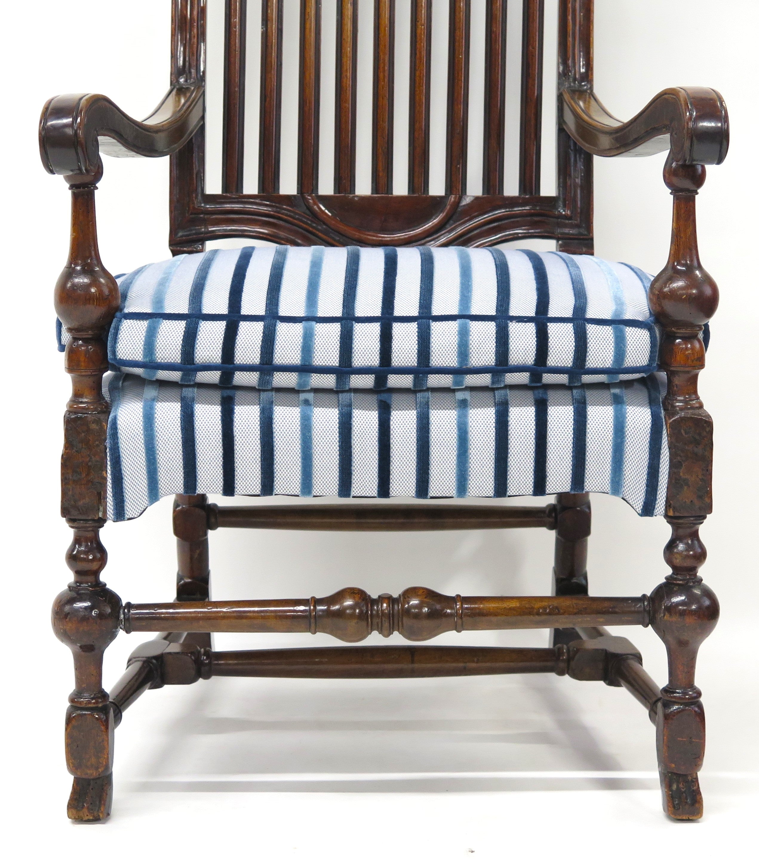 A Rare Form William and Mary Walnut Banister Back Armchair