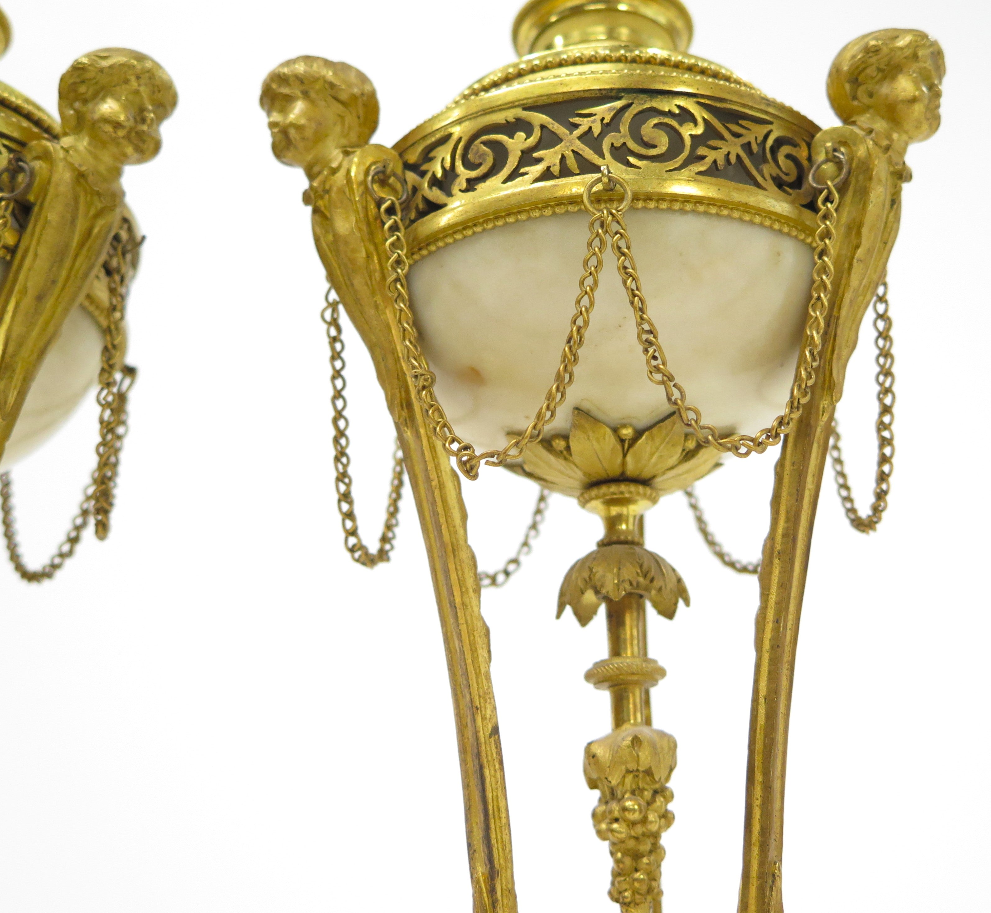 A Pair of Louis XVI Ormolu and White Marble Cassolettes