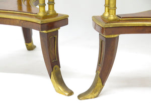 A pair of elegant Louis XVI-style gilt bronze gueridons