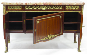 A French Ormolu-mounted Amaranth, Kingwood, Bois Satine, and Burr-amboyna Commode