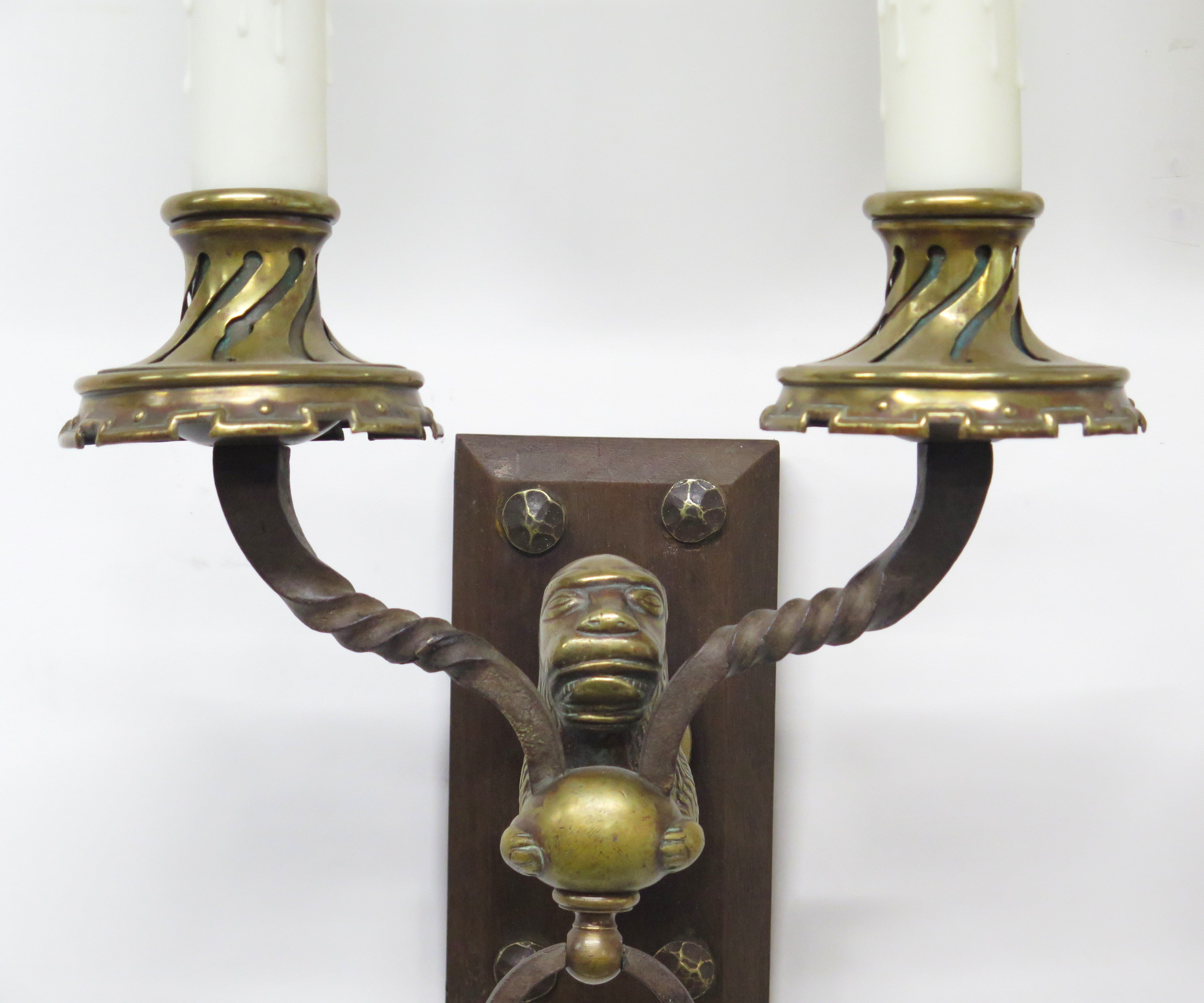 A Pair of Early 20th C. Hand Wrought Iron Two Light Sconces