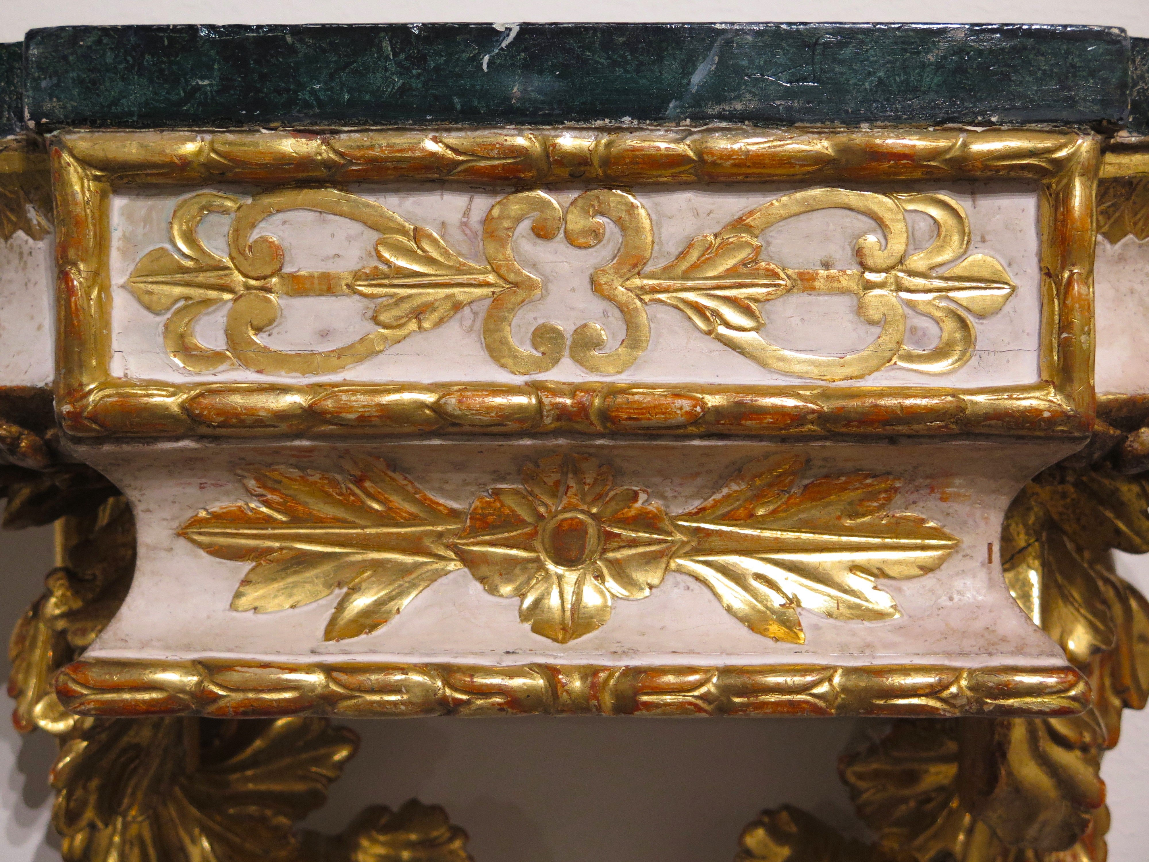 Pair of Carved Painted and Parcel Gilt Wall Brackets