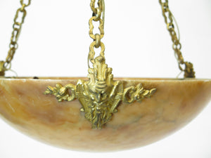 A French Art Deco alabaster and gilt bronze chandelier