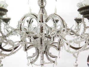 Italian Baroque Style Iron, Cut And Beaded Glass Eight Light Chandelier