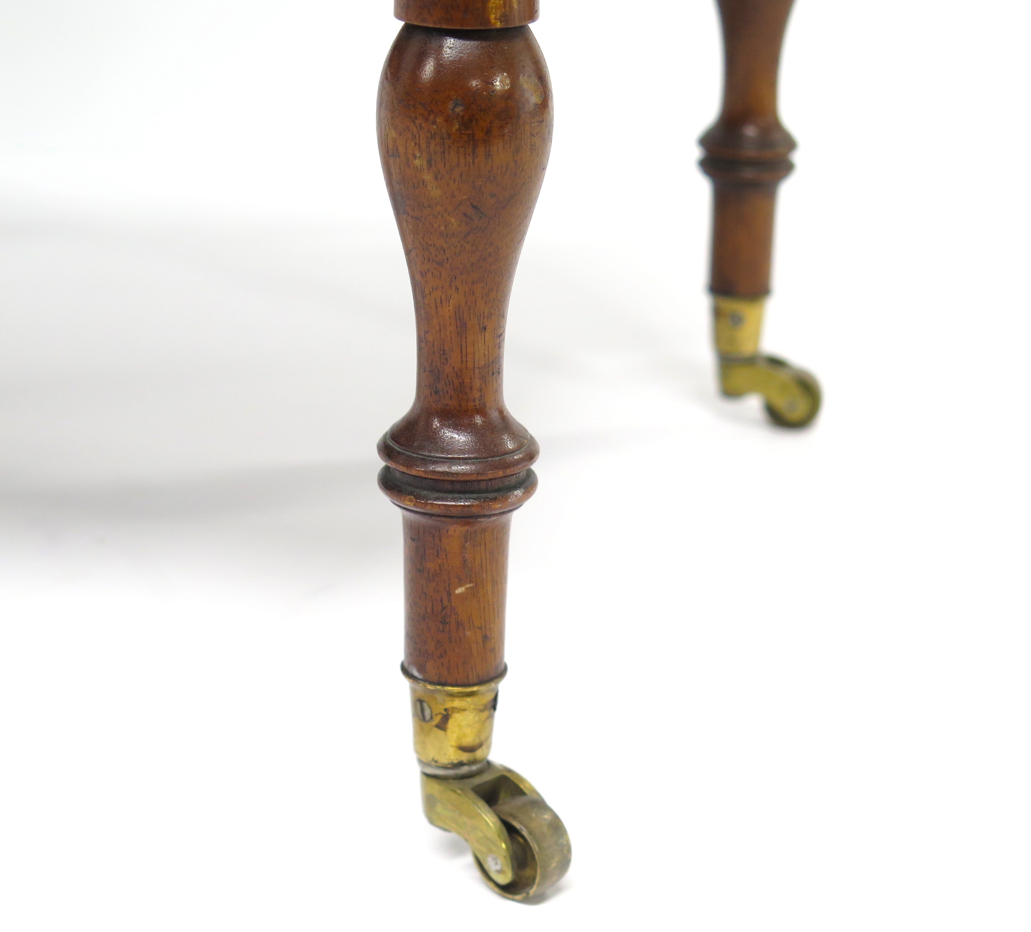 An Early 19th Century Mahogany Concave Shaped 4 Section Canterbury