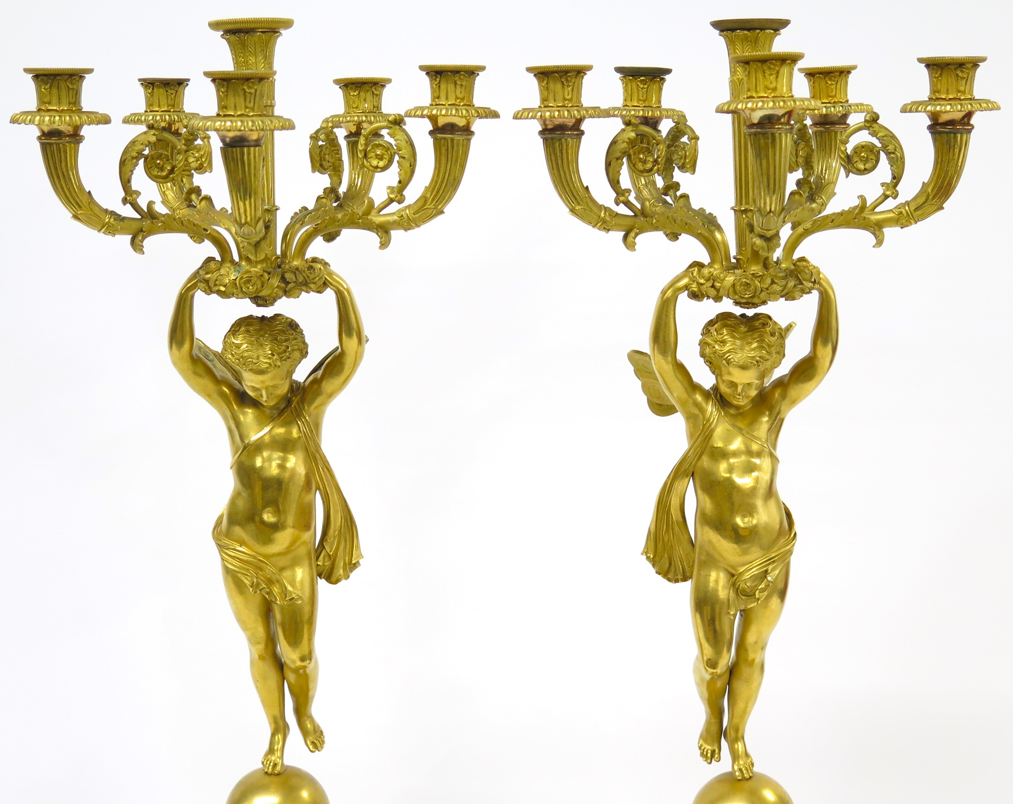 A Pair of French Empire Six Light Figural Candelabra