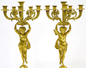 A Pair of French Empire Six Light Figural Candelabra