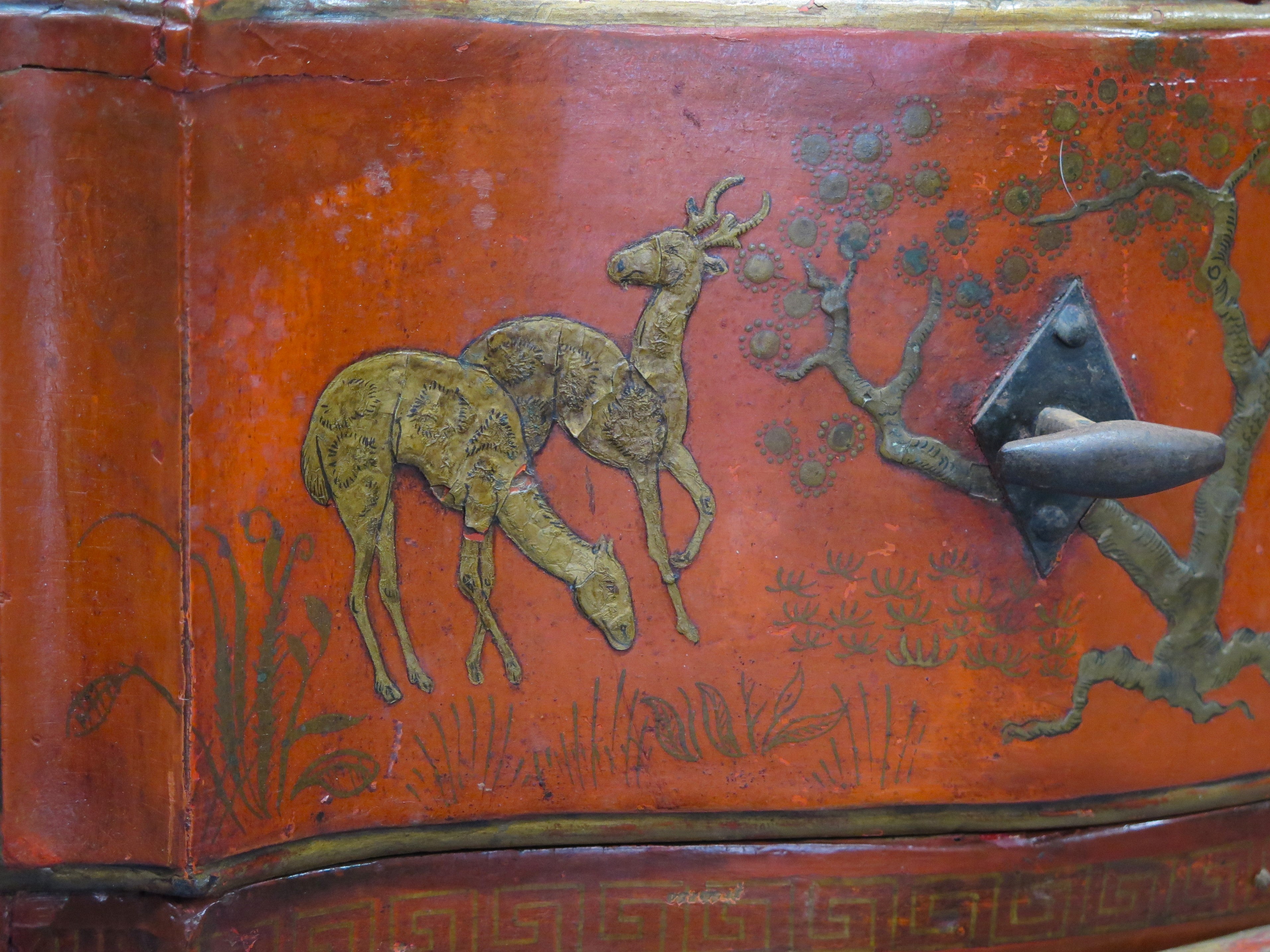 A Continental Red Chinoiserie Decorated Chest