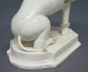 A Pair of Early 19th Century Creamware Dogs