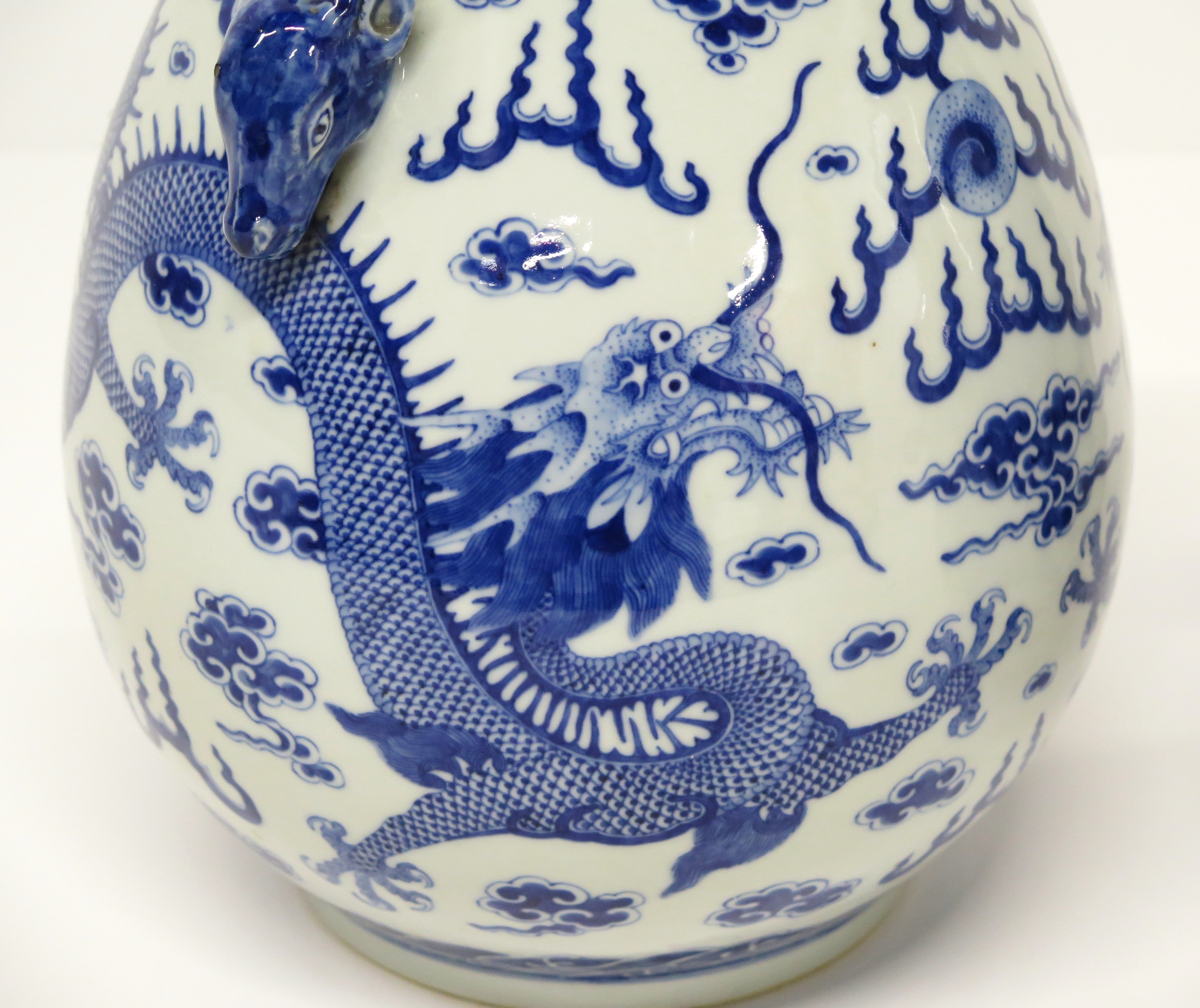 A Pair of Chinese Blue and White Gu form Vases