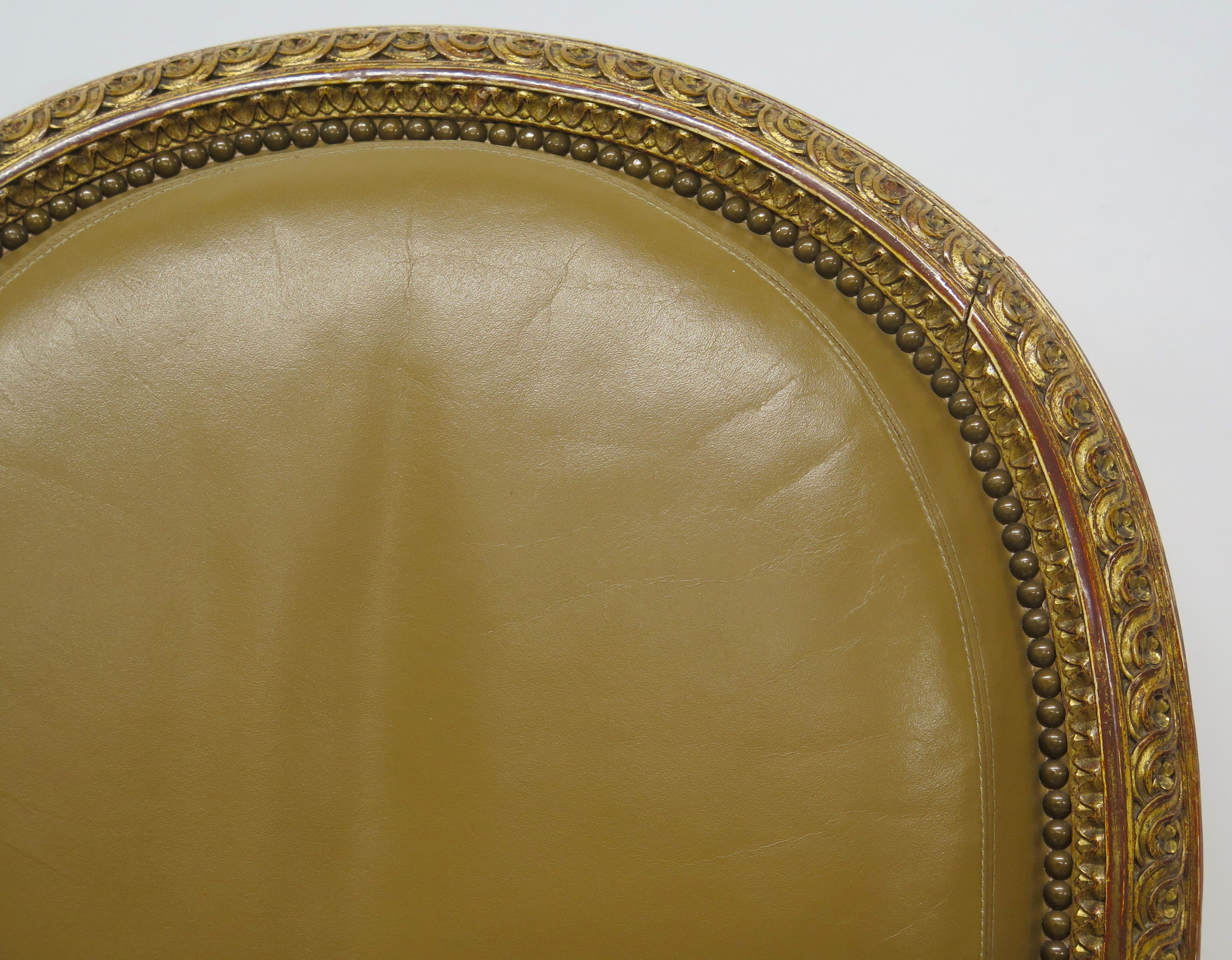 Louis XVI-Style Carved and Gilded Leather Fauteuil