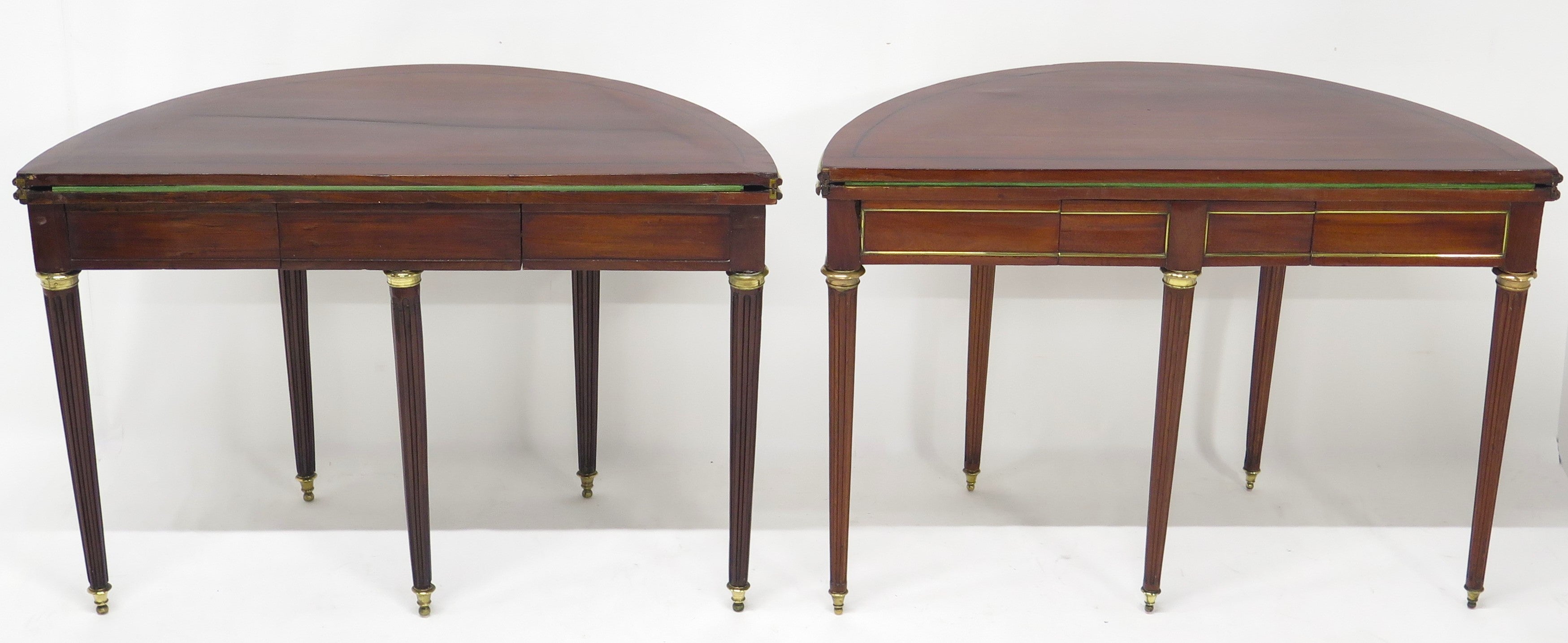 A Beatiful "Near" Pair of Louis XVI Style Mahogany and Brass Mounted Demilune Games Tables