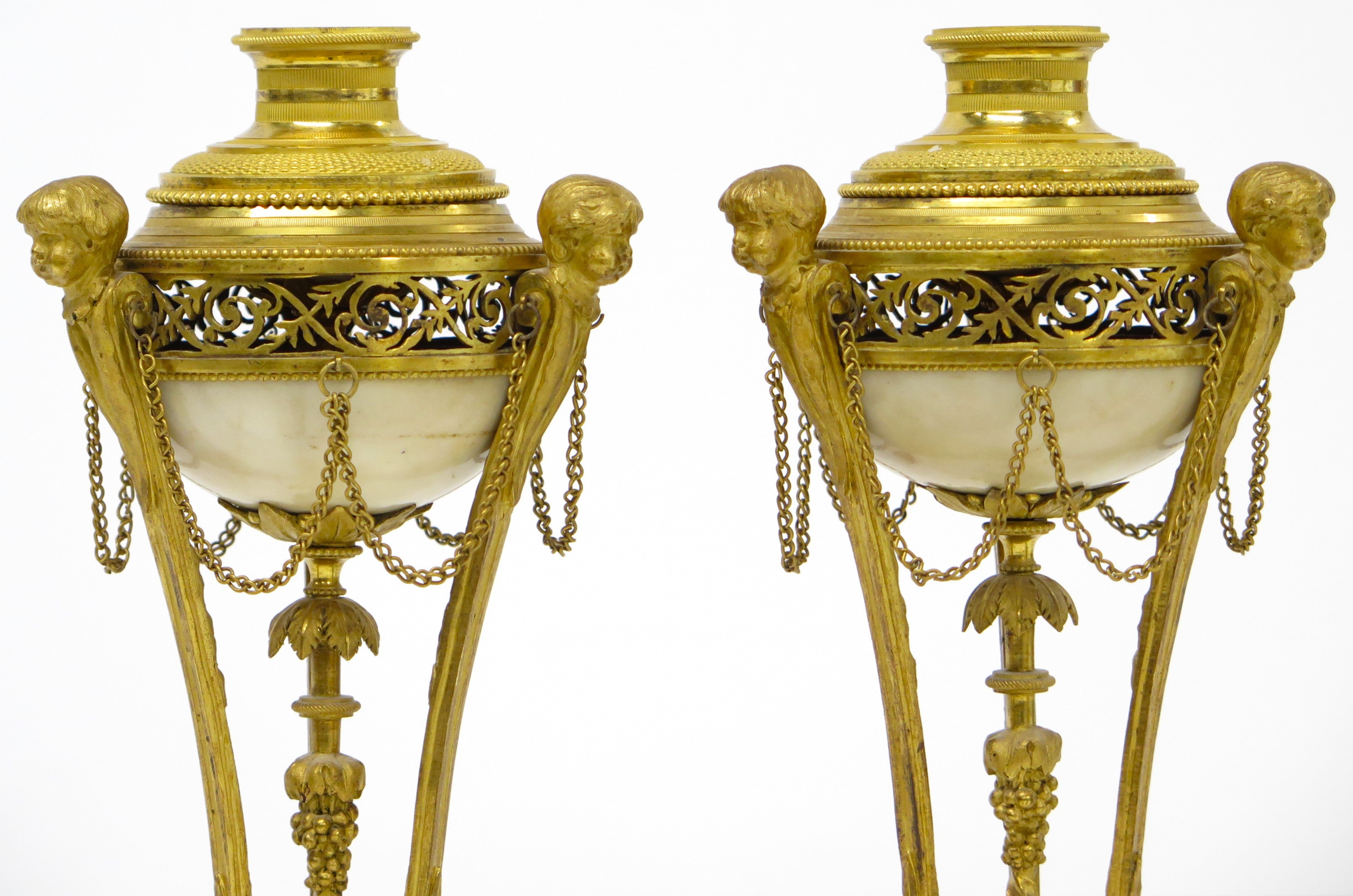 A Pair of Louis XVI Ormolu and White Marble Cassolettes