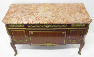 A French Ormolu-mounted Amaranth, Kingwood, Bois Satine, and Burr-amboyna Commode