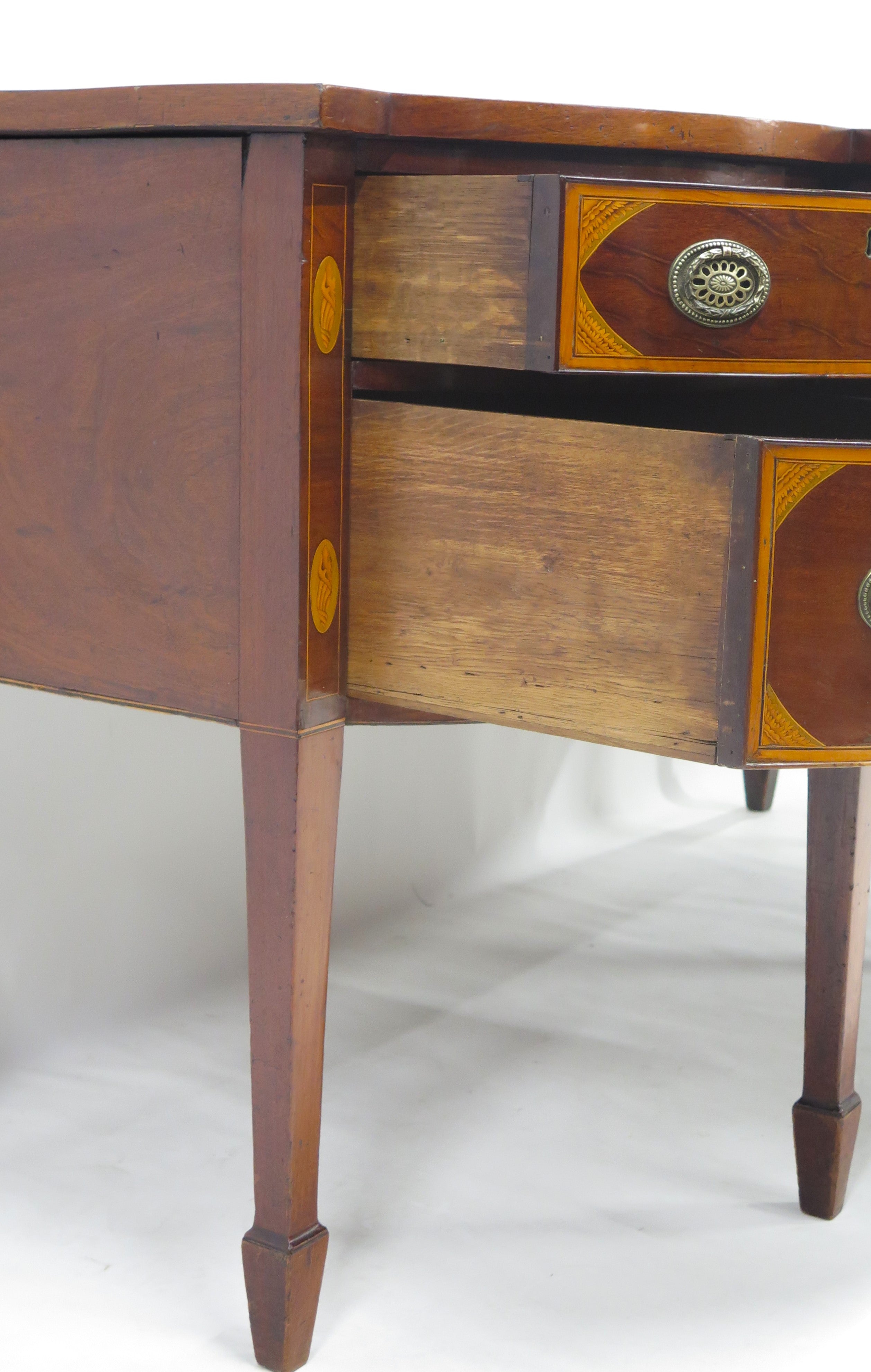 A Very Fine Mahogany, Satinwood and Harewood Stepped Bow Front Sideboard