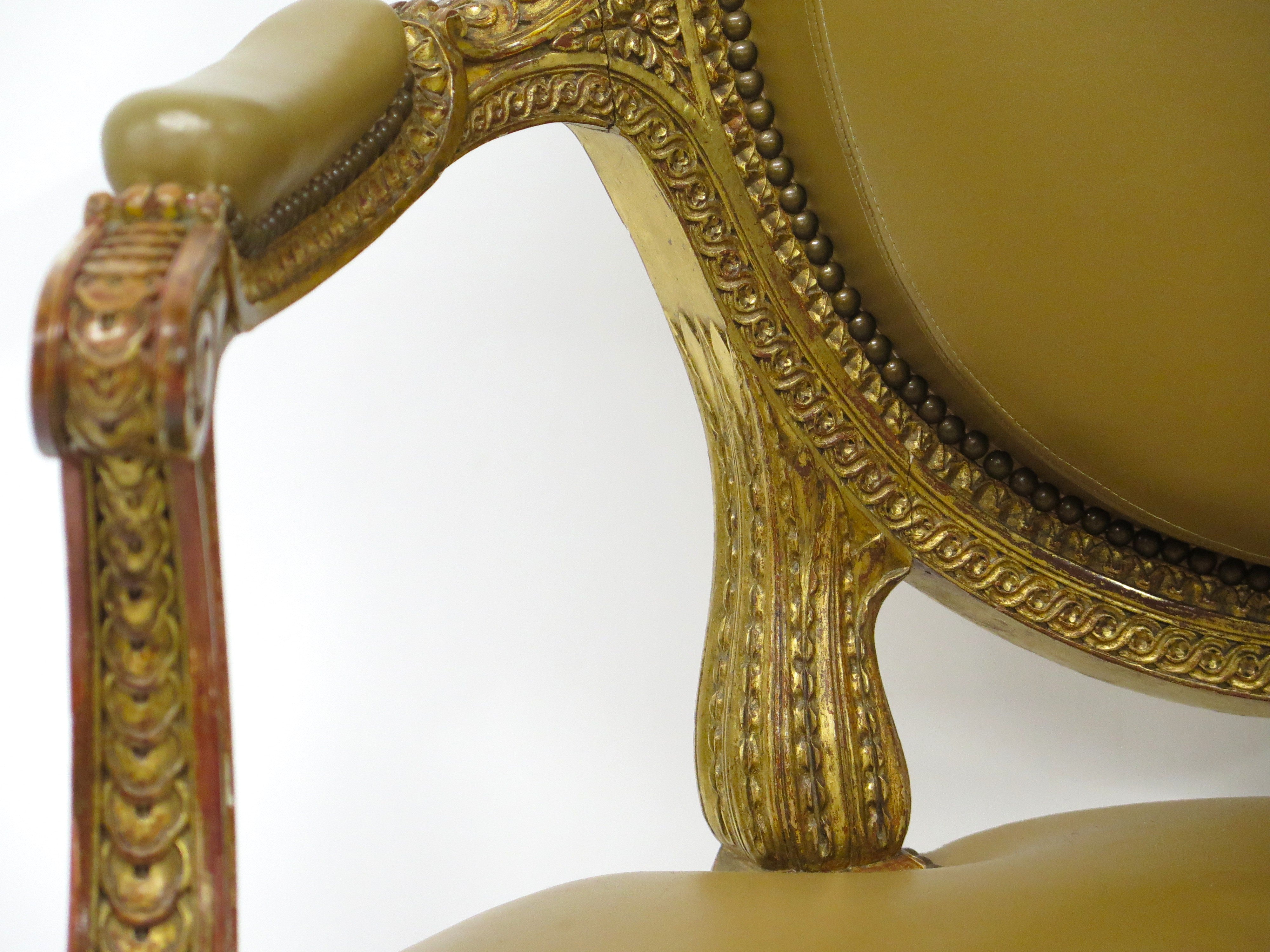 Louis XVI-Style Carved and Gilded Leather Fauteuil