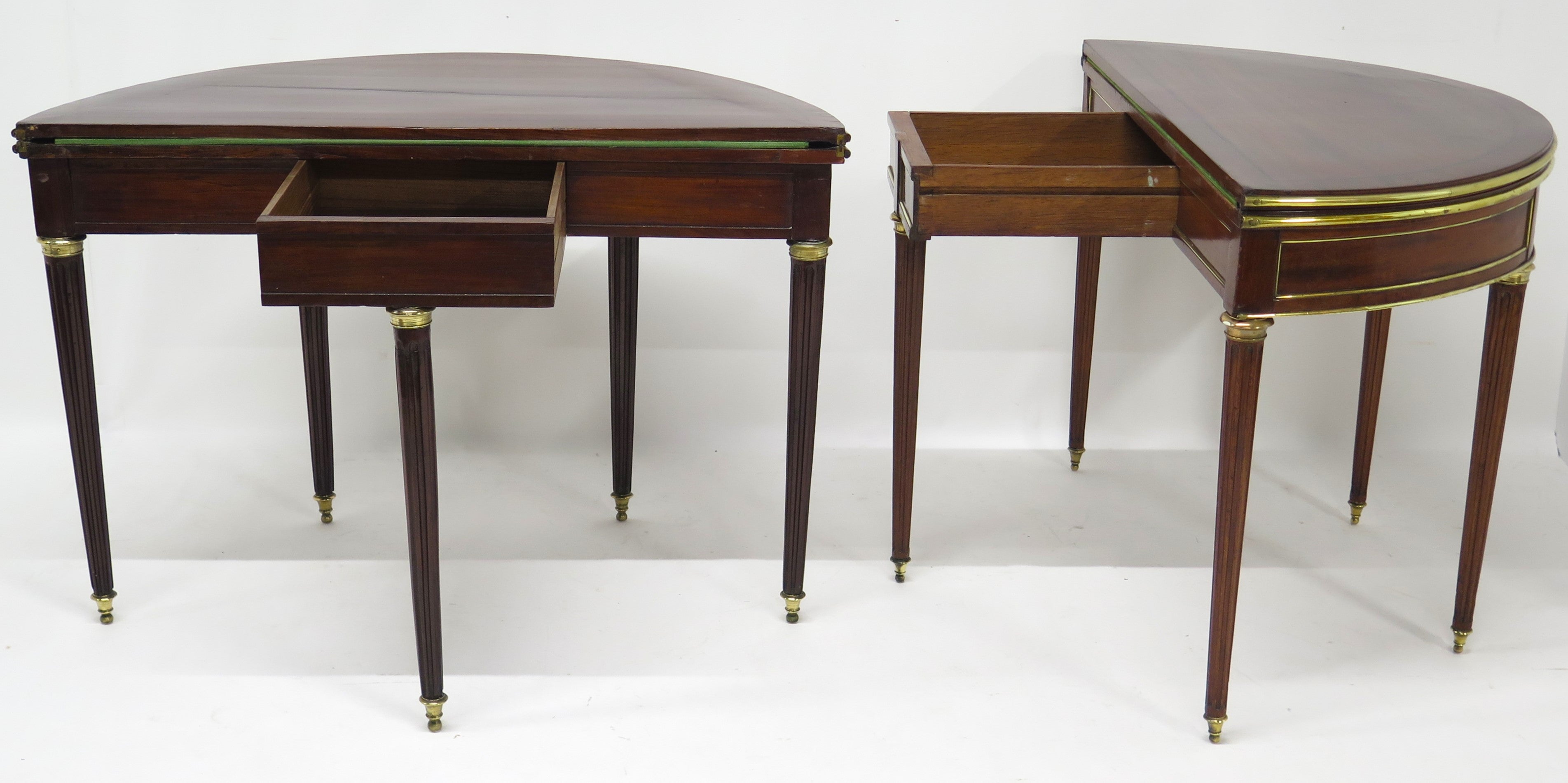 A Beatiful "Near" Pair of Louis XVI Style Mahogany and Brass Mounted Demilune Games Tables