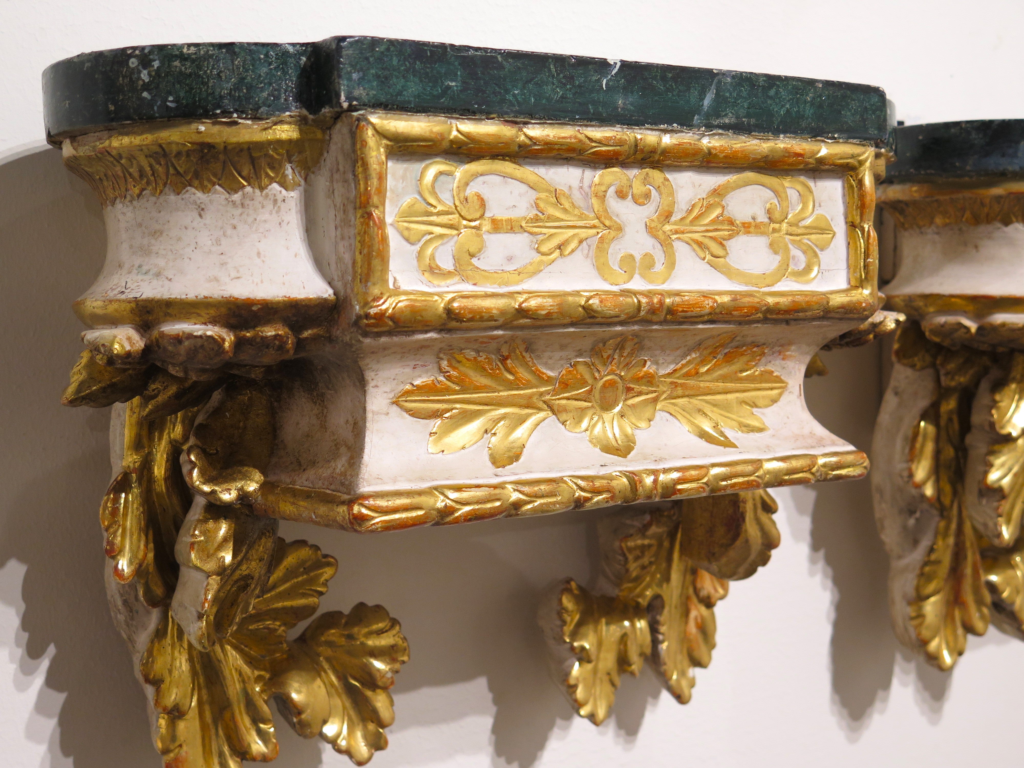 Pair of Carved Painted and Parcel Gilt Wall Brackets