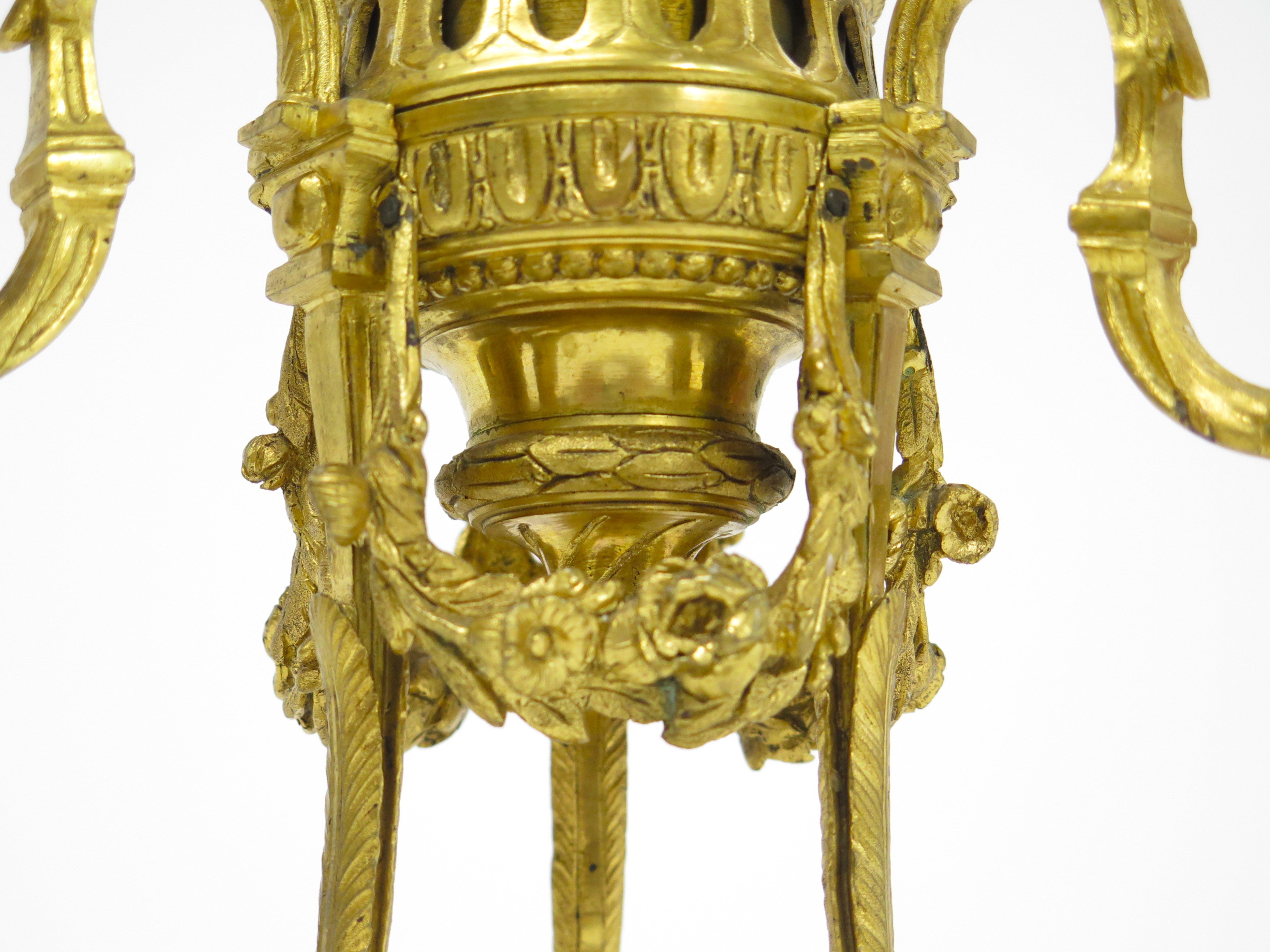 A Pair of Finely Cast and Chased Louis XVI Ormalu Four-Light Cassolette