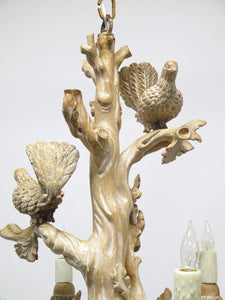 A Carved Italian Faux Bois Pickled Ten Light Chandelier