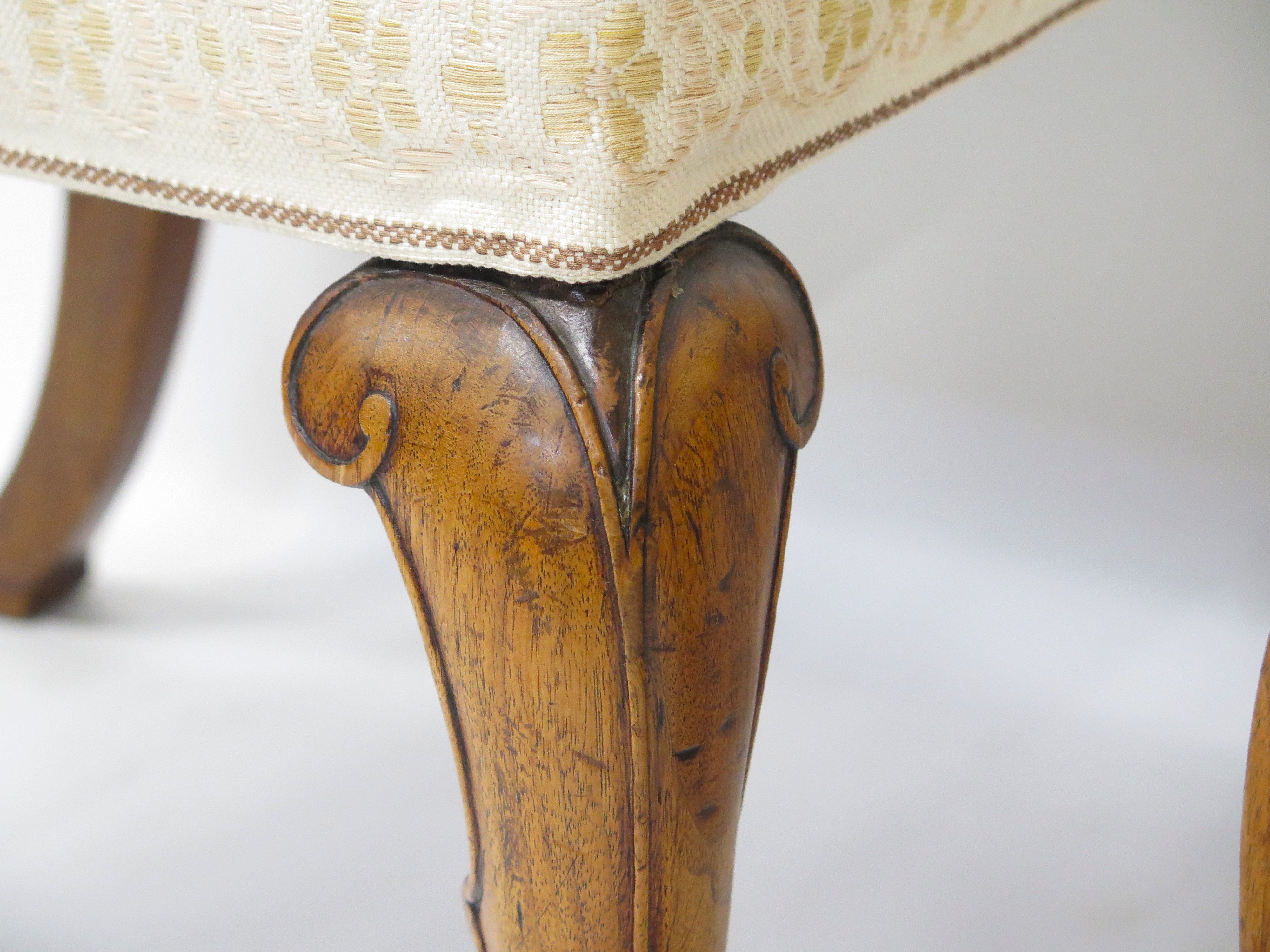 A Pair of Queen Anne Style Walnut Upholstered Backstools / Chairs