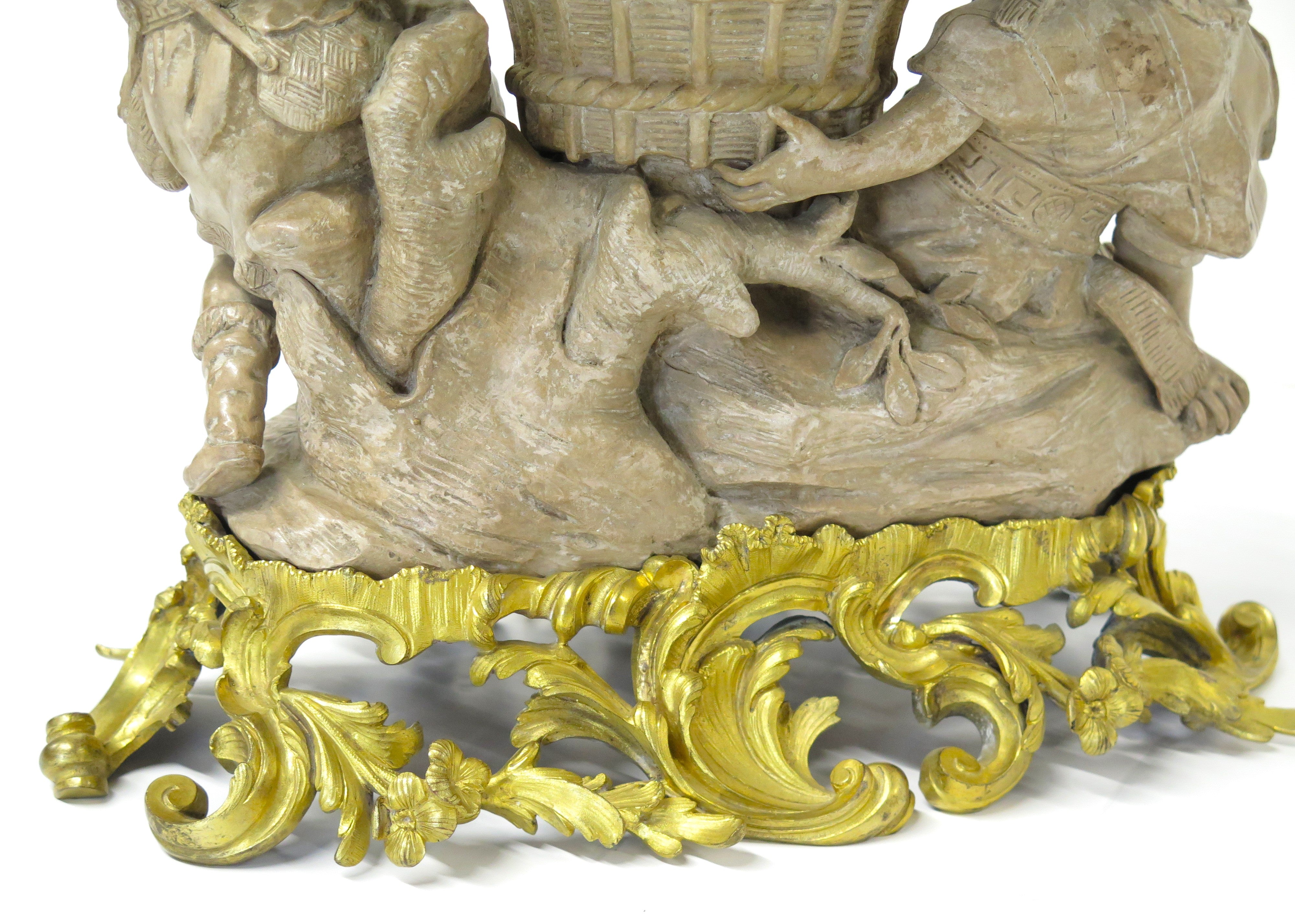 A Louis XV-Style Ormolu Mounted Terracotta Tôle Painted and Porcelain Centerpiece