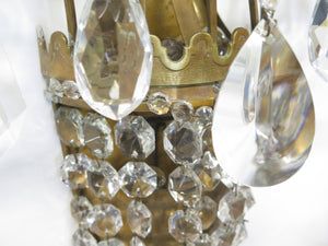 A Pair of Maison Jansen Three Light Bronze and Crystal Sconces
