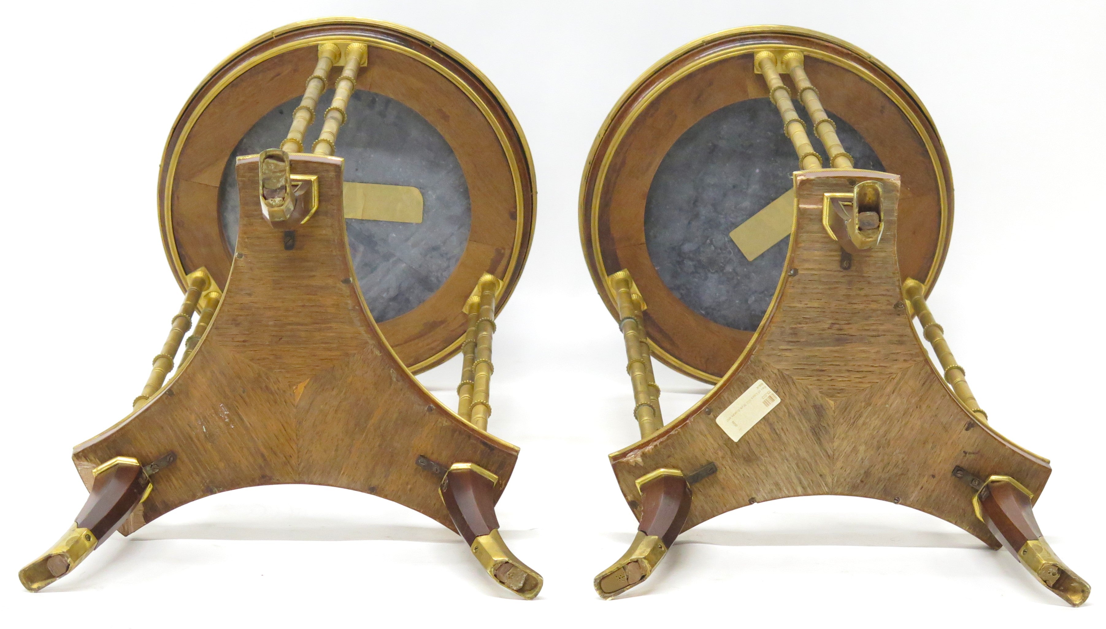 A pair of elegant Louis XVI-style gilt bronze gueridons