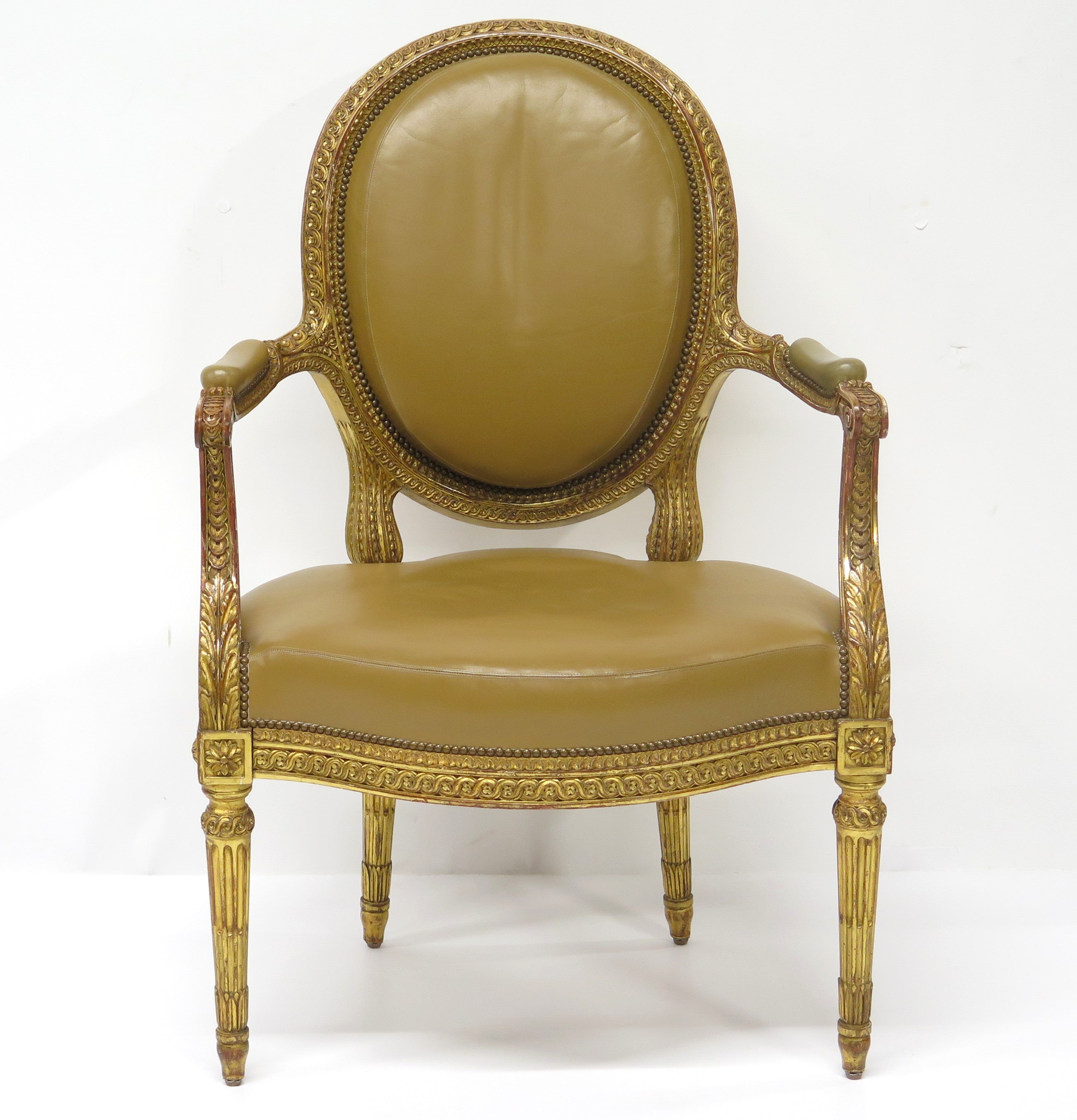 Louis XVI-Style Carved and Gilded Leather Fauteuil