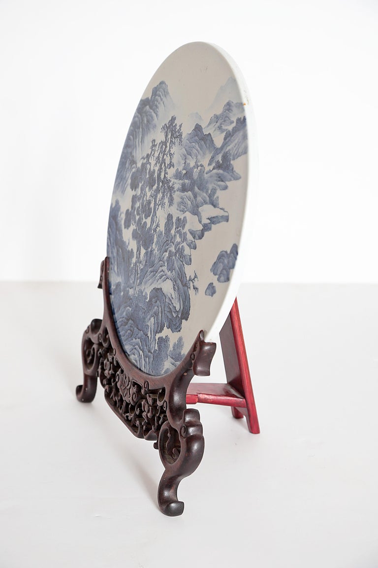 Chinese Blue and White Porcelain Plaque with a Carved Wooden Stand