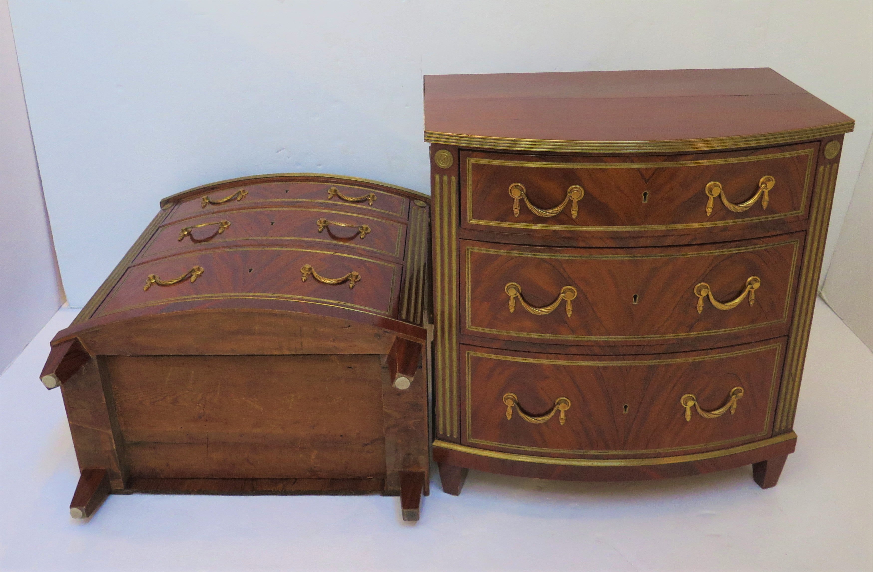 A Pair of Russian Neoclassical Chests of Drawers