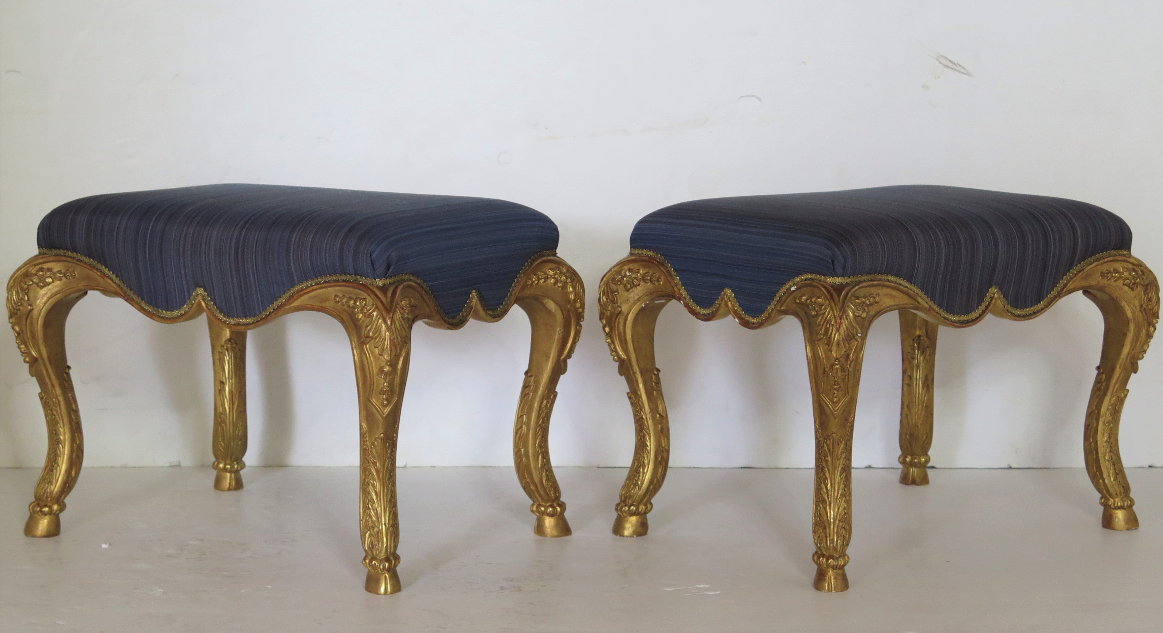 Pair of Petite Régence-Style Carved and Gilded Stools