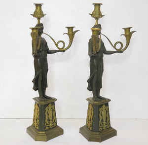 A Pair of Gilt and Patinated Bronze Candelabra