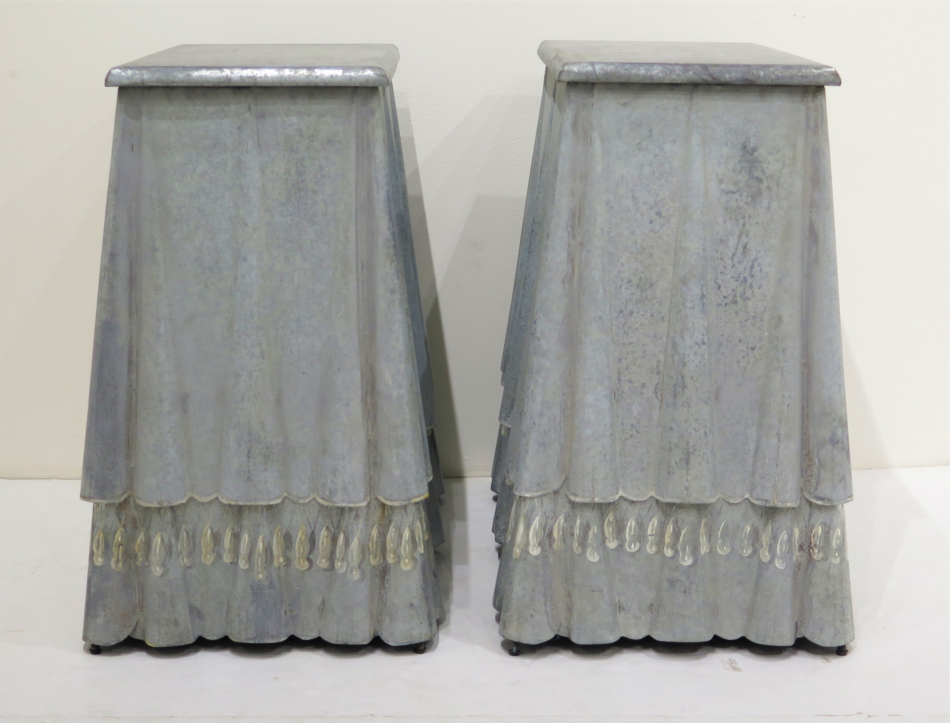 Pair of "Draped Metal" Console Tables with Faux Tassel Border