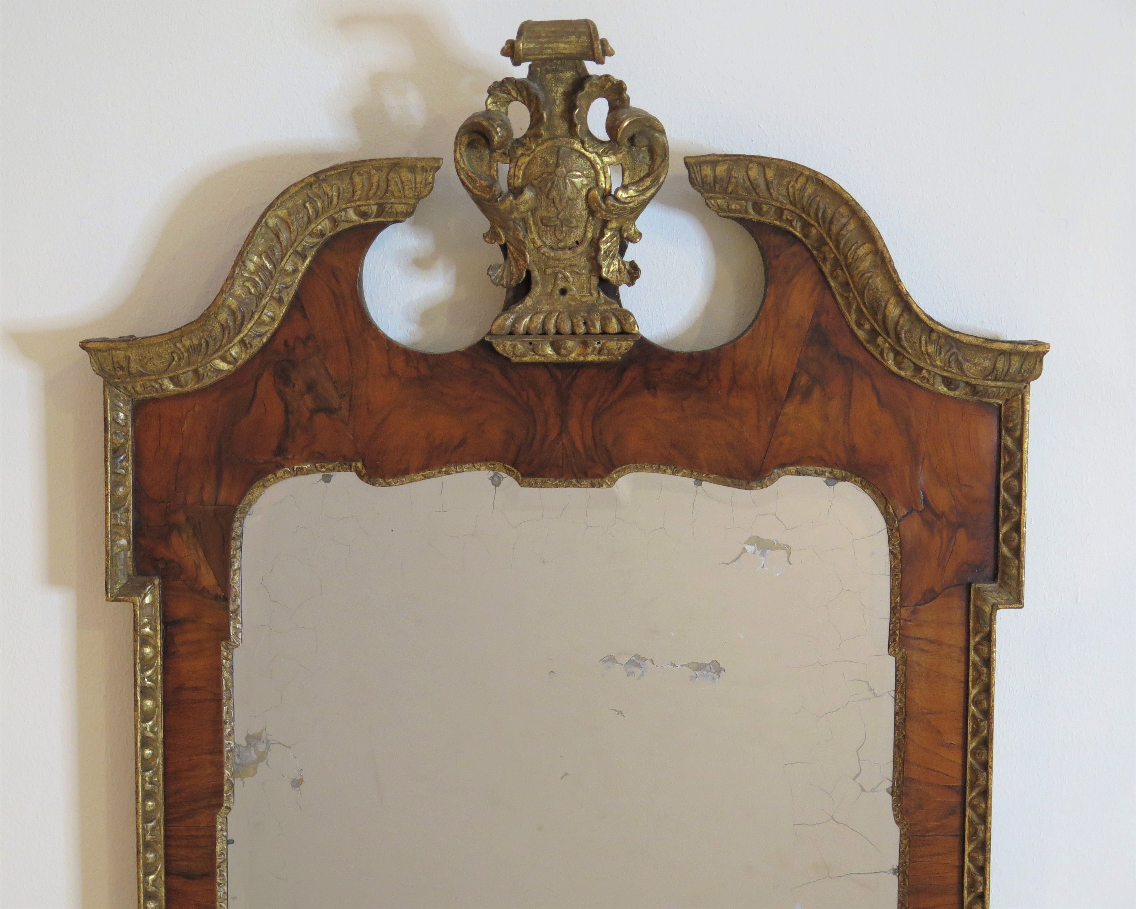 A Grand George II Walnut Pier Glass with Swan's Neck Pediment