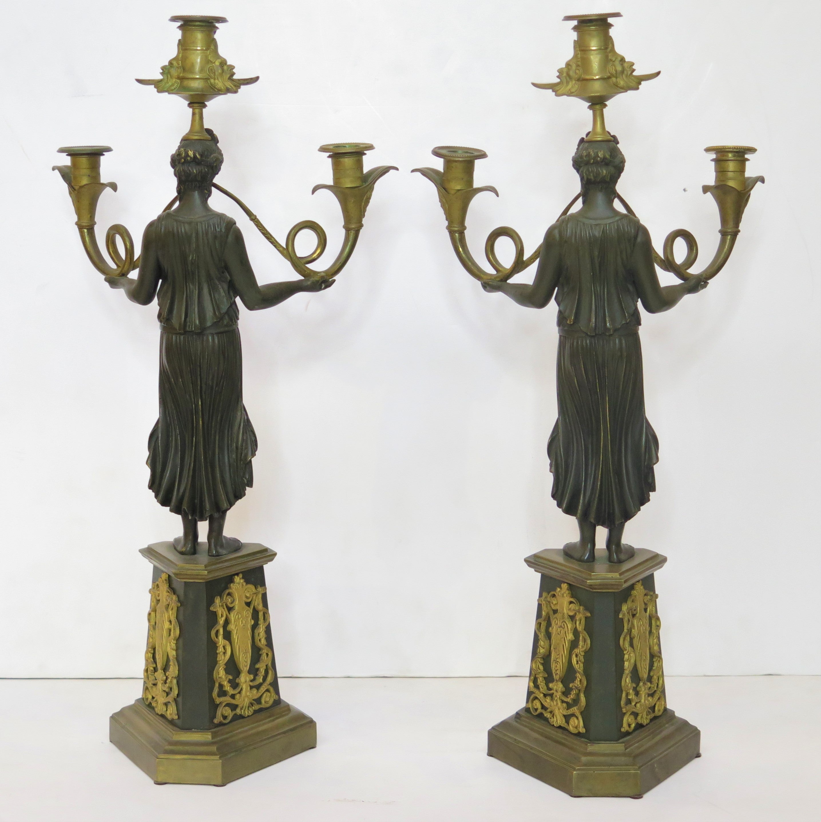 A Pair of Gilt and Patinated Bronze Candelabra