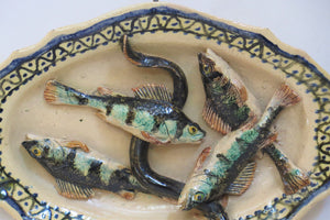 "School of Tours" French Faience Plate with Four Fish and an Eel