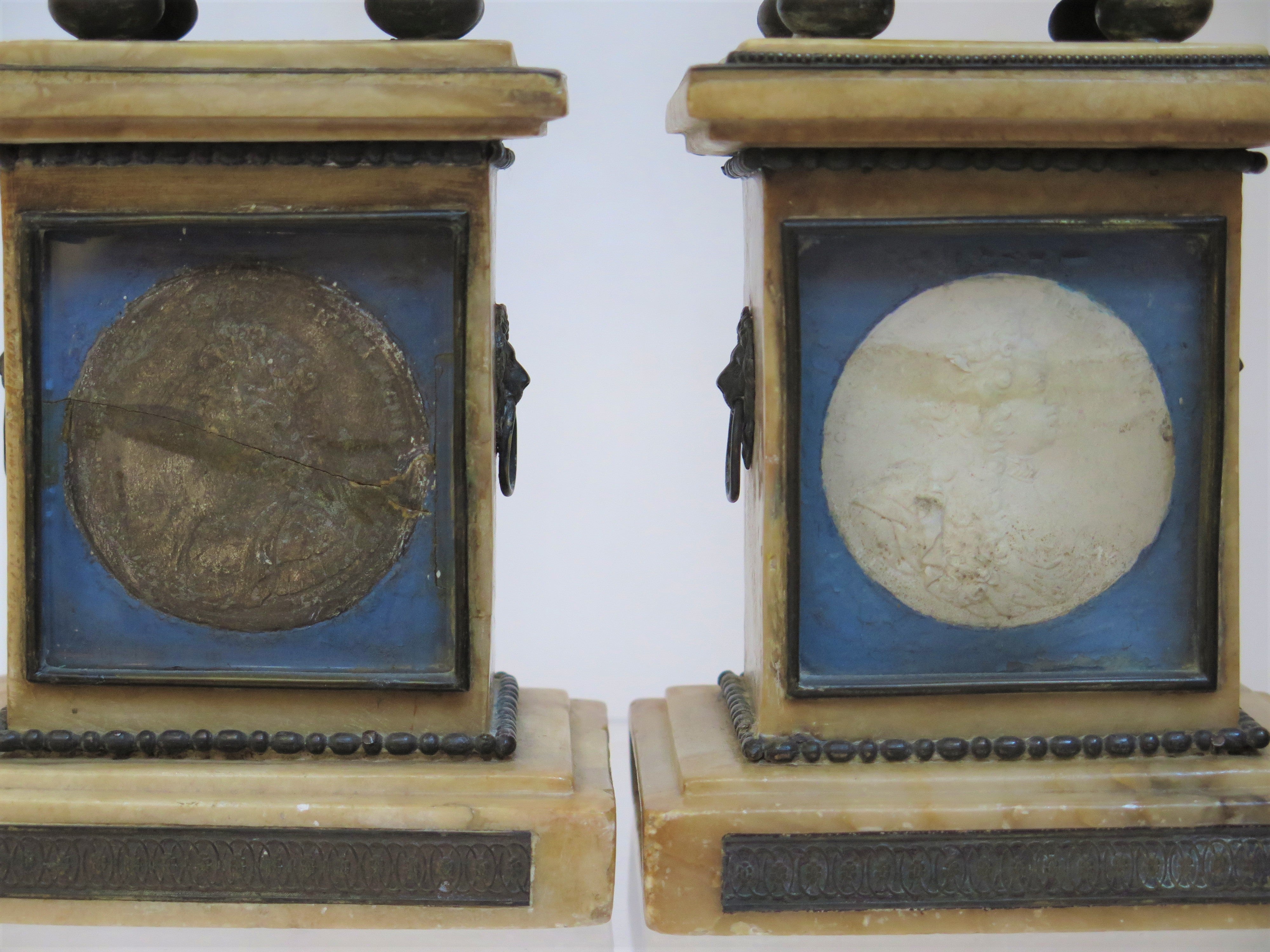 Pair of Marble Obelisks with Plaster Portrait Relief Medallions