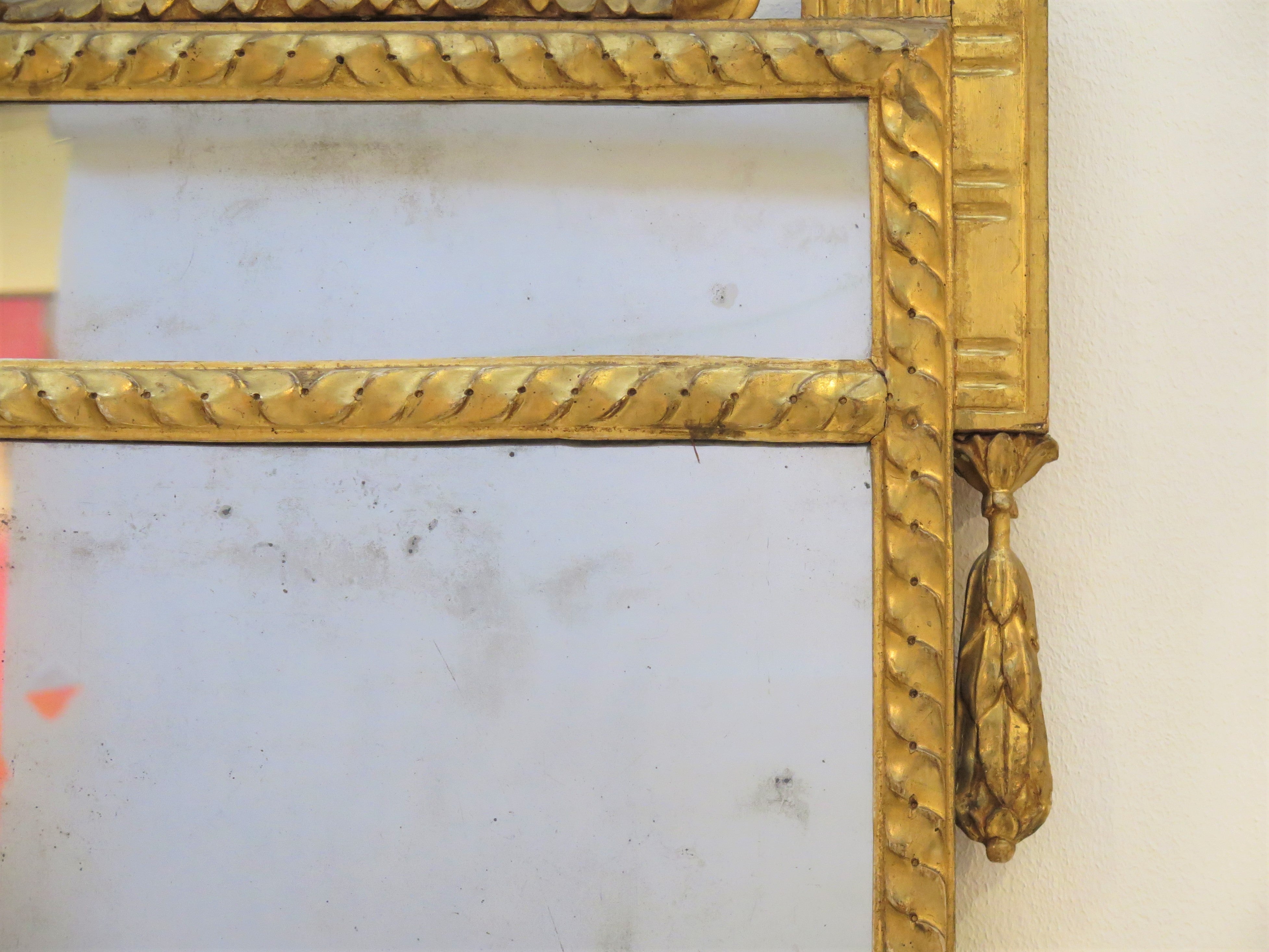 An Italian Neoclassical Carved Giltwood Pier Glass Mirror