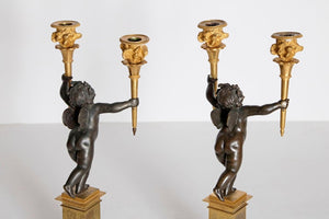 Charles X Patinated and Gilt Bronze Figural Candelabra