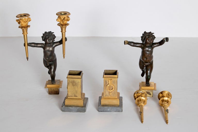 Charles X Patinated and Gilt Bronze Figural Candelabra